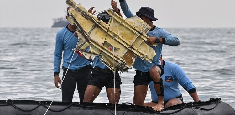 indonesian plane crash site body parts