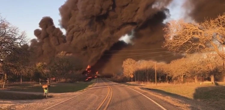 Train carrying oil tankers catches fire after colliding with semi-truck in Texas