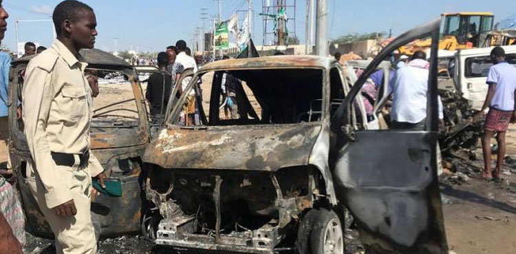 At least 20 killed by suicide car bomb near restaurant in Somalia capital