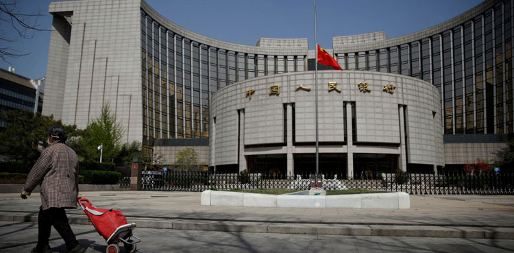 China central bank head says policy needs to selectively support growth, curb risks