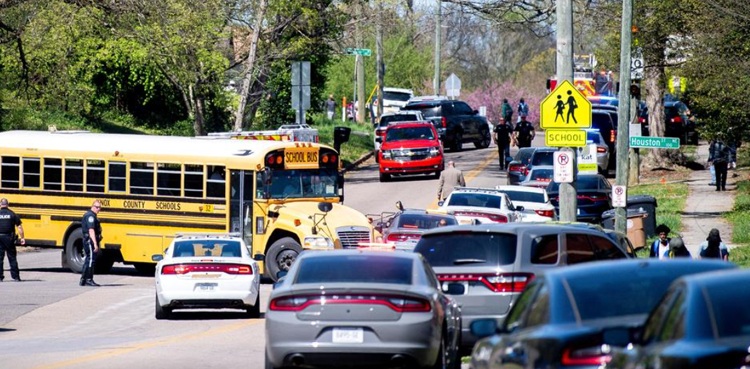 Student shot dead at high school after police say he fired on them