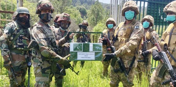 In pictures: Pakistan, Indian armies exchange sweets on Eidul Fitr