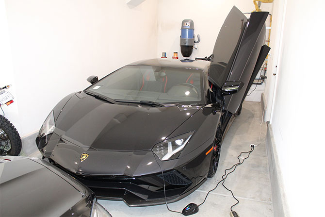man luxury sports cars covid-19 funds vacations mustafa qadiri