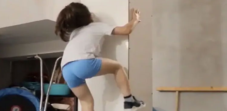 kid-spider-man-climbs-wall