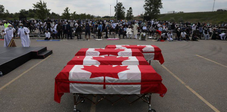 Muslim victims of truck attack given farewell with coffins draped in Canadian flags