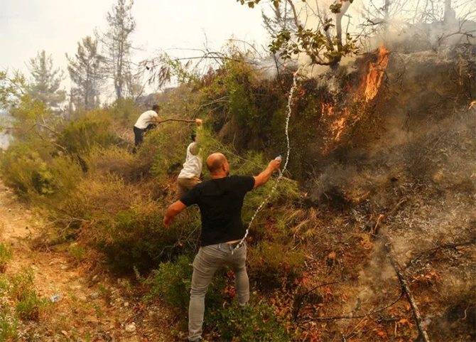 Death toll in Turkey wildfires rises to eight, coastal resorts affected