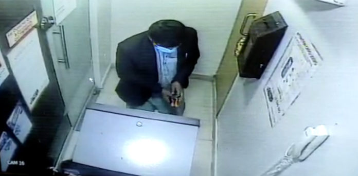 WATCH: Man caught red-handed while trying to break ATM machine