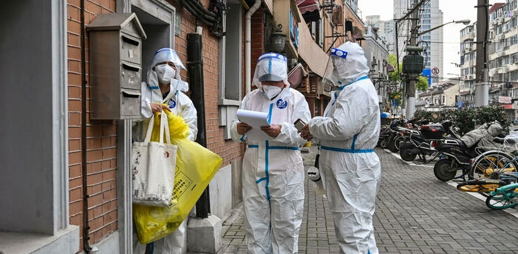 Half of Shanghai in lockdown to curb Covid-19 outbreak