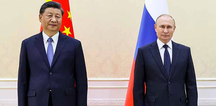 Putin, Xi hail 'great power' ties at talks defying West