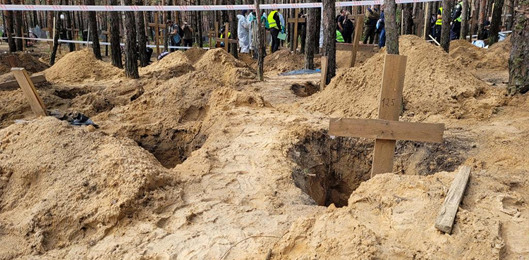 Ukraine mass grave, exhumed bodies