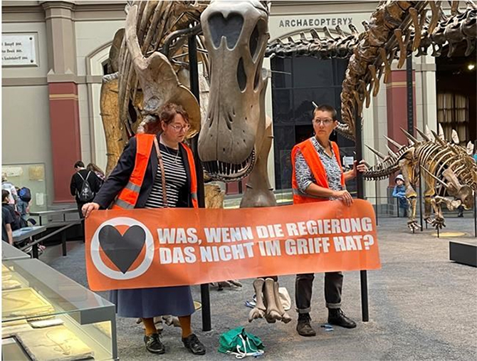 German eco activists, dinosaur exhibit, Berlin Natural History Museum