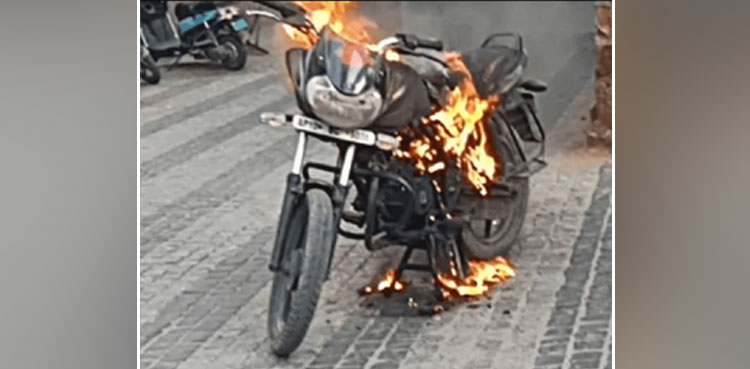 man burns motorcycle, motorcycle,