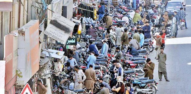 KMC, charged parking, Karachi, parking contracts