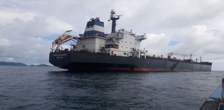 Strong winds, burning ship salvage, Dutch coast