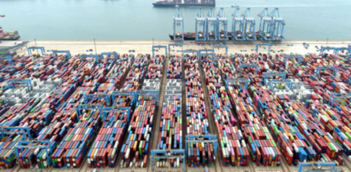 Chinese exports top forecasts, imports slow