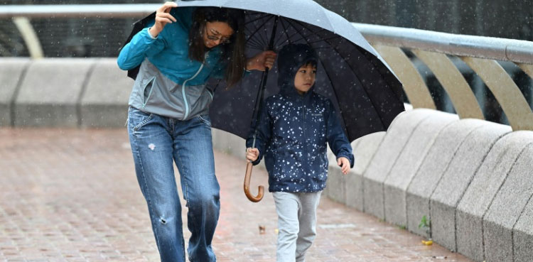 Hong Kong closes schools, raises warning for Typhoon Koinu