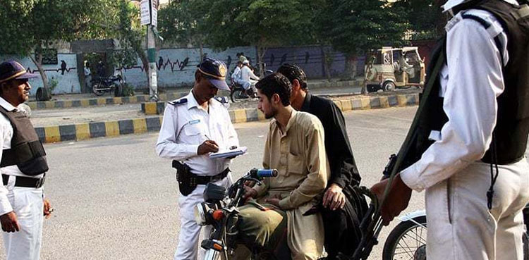 Motorbike riding without helmet banned on Shahrah-e-Faisal