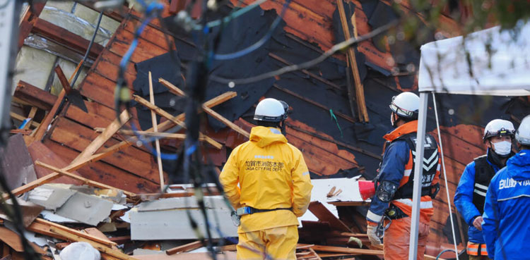 Elderly woman pulled from rubble five days after Japan quake