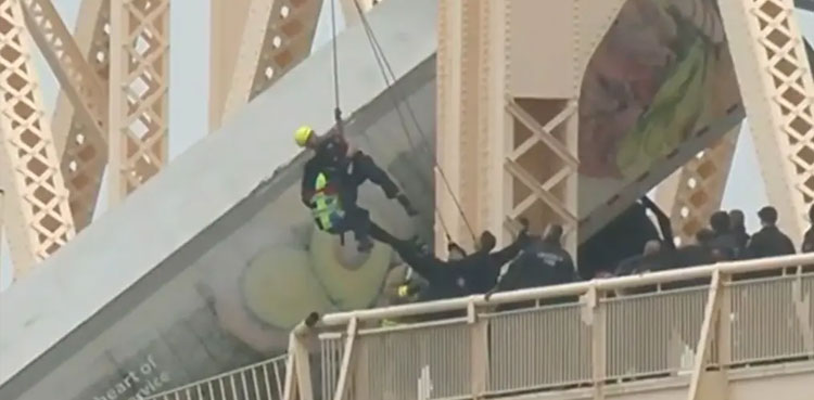 Woman truck bridge, truck dangling, truck bridge