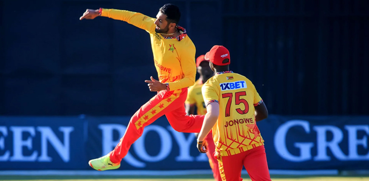 Zimbabwe players, Zimbabwe fans, celebrate joyfully, defeating India