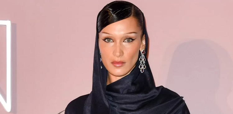 bella hadid, adidas, bella hadid dropped from adidas campaign