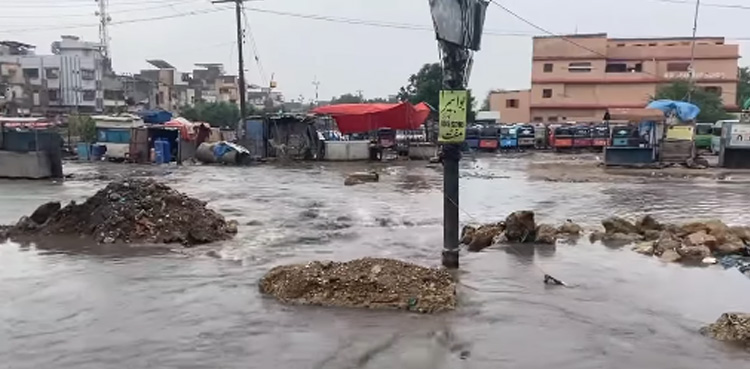 Karachi, post-rain flooding, causes commuting disruption