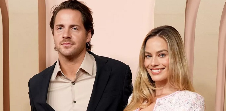 margot robbie, Tom Ackerley, first child